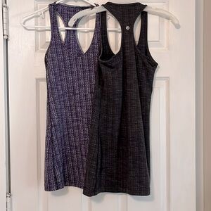Set of 2 Lululemon athletic dresses. Black/grey and black/purple.